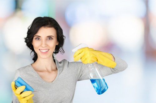 Cleaning a Brixton building facade on a busy South London street